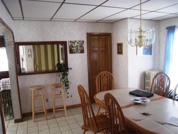 74 Madison Avenue Everett, MA 02149 - Photo 6 of 28 a dining room with furniture and window