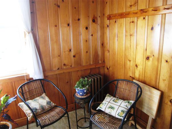 74 Madison Avenue Everett, MA 02149 - Photo 9 of 28 a view of a hallway with furniture and lounge chair