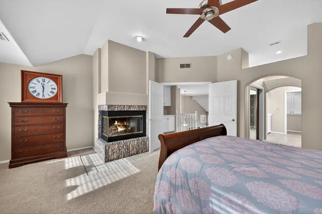 a room with furniture and a fireplace