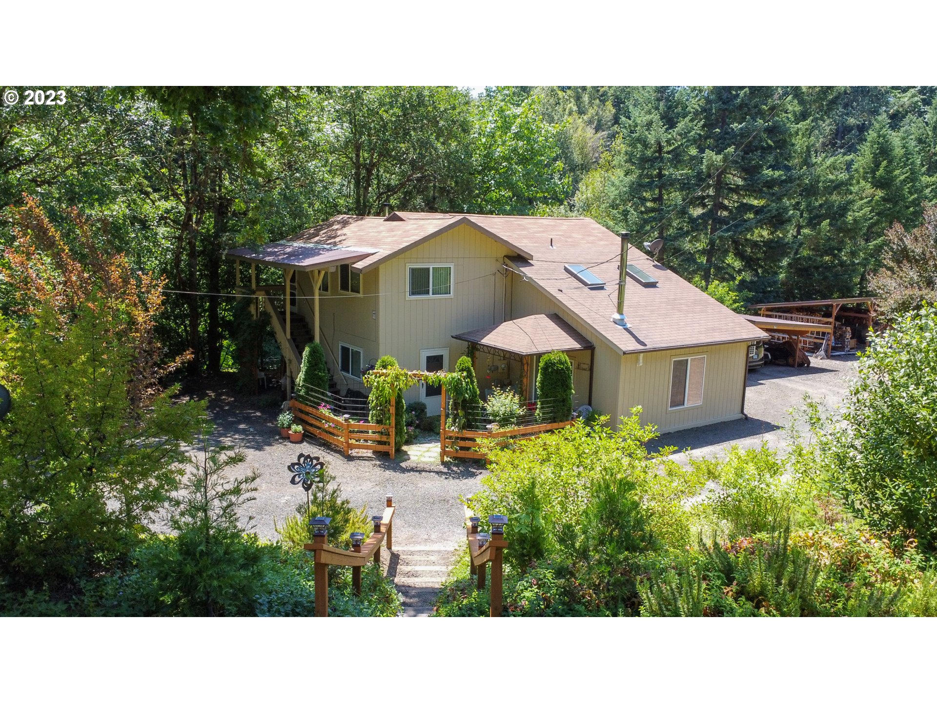 13141 Driver Valley Road Oakland, OR 97462 - Photo 1 of 48 a view of a house with sitting area