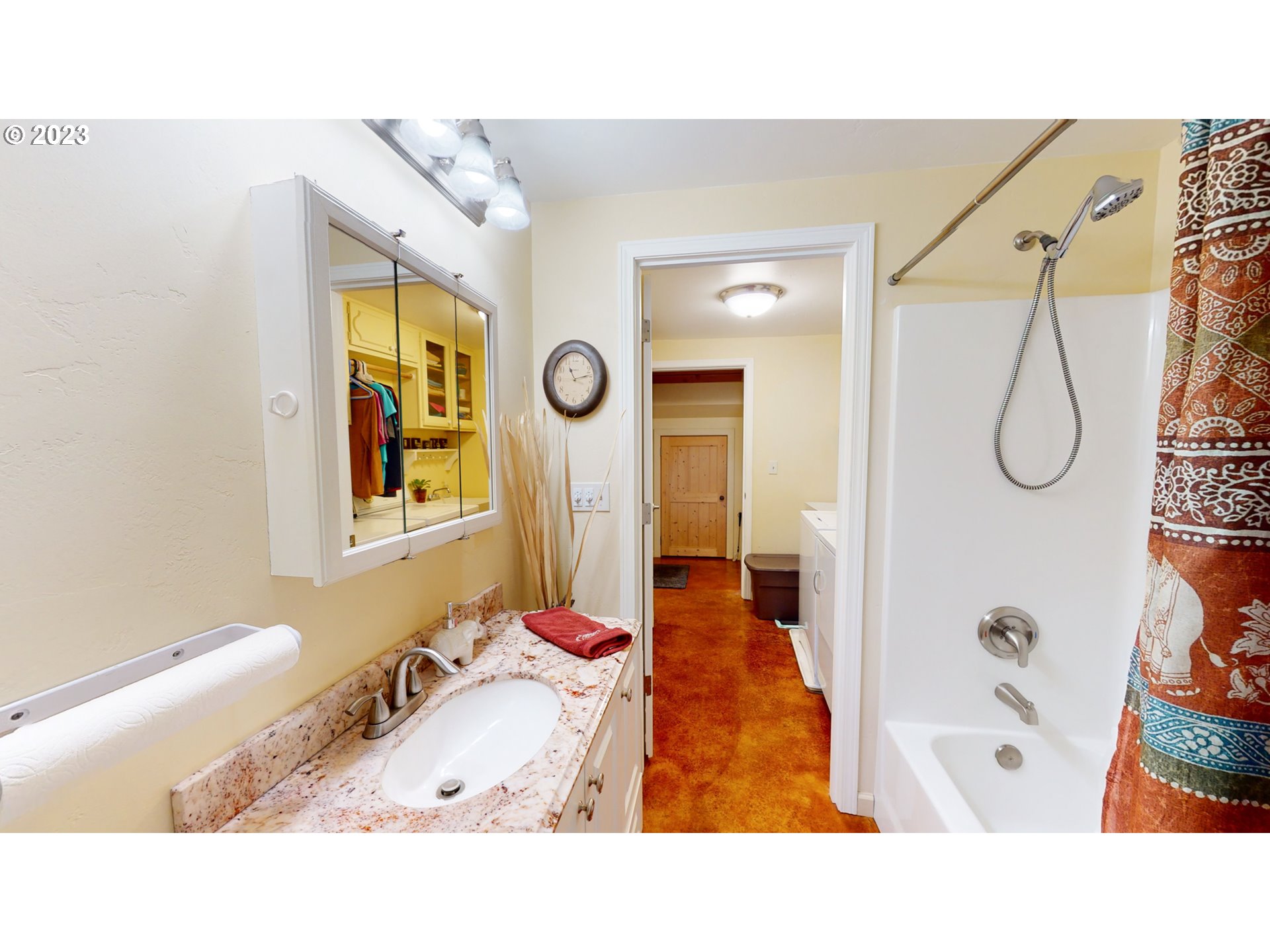 13141 Driver Valley Road Oakland, OR 97462 - Photo 14 of 48 a bathroom with a tub sink and mirror