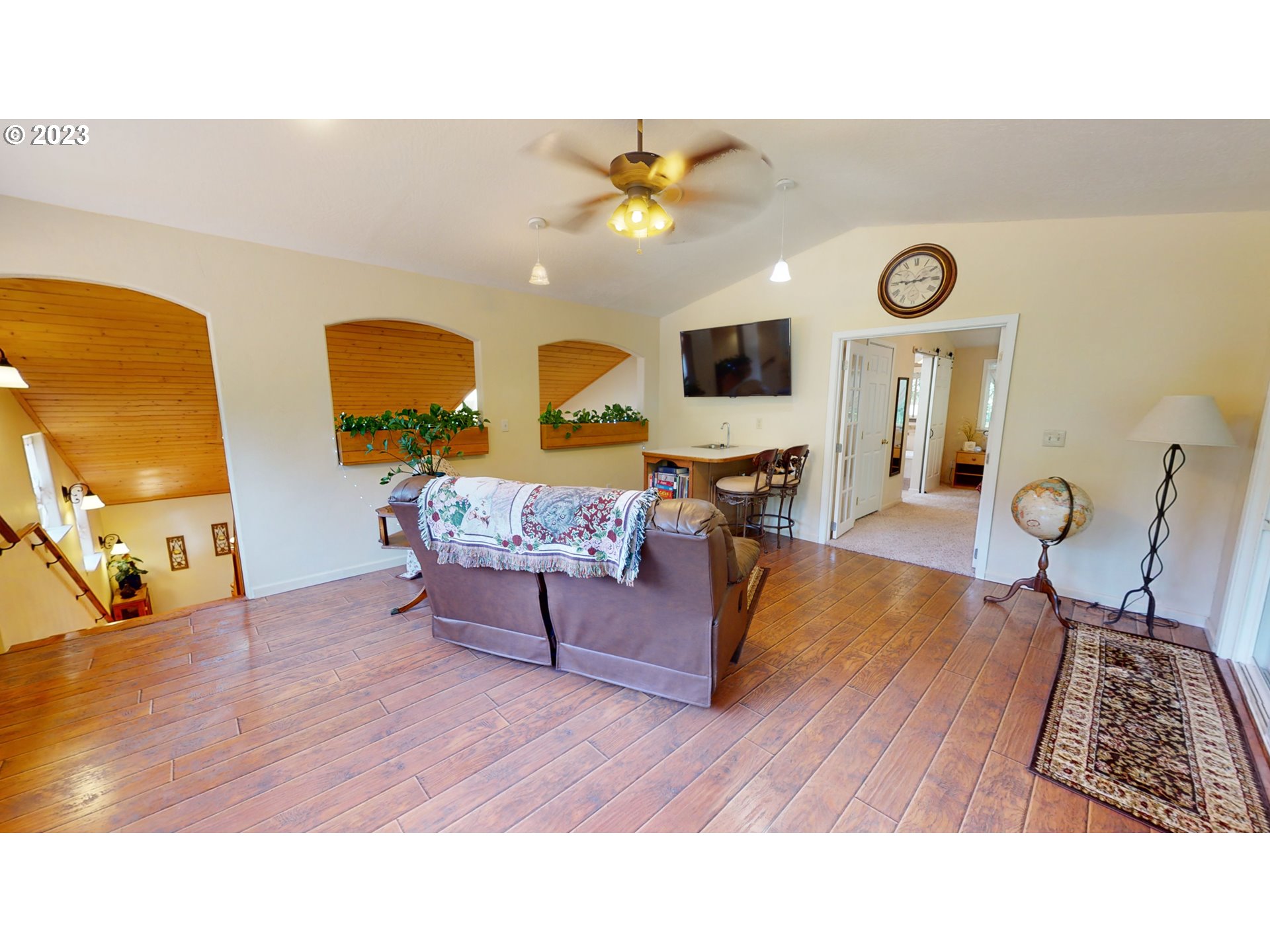 13141 Driver Valley Road Oakland, OR 97462 - Photo 20 of 48 a living room with furniture and a wooden floor
