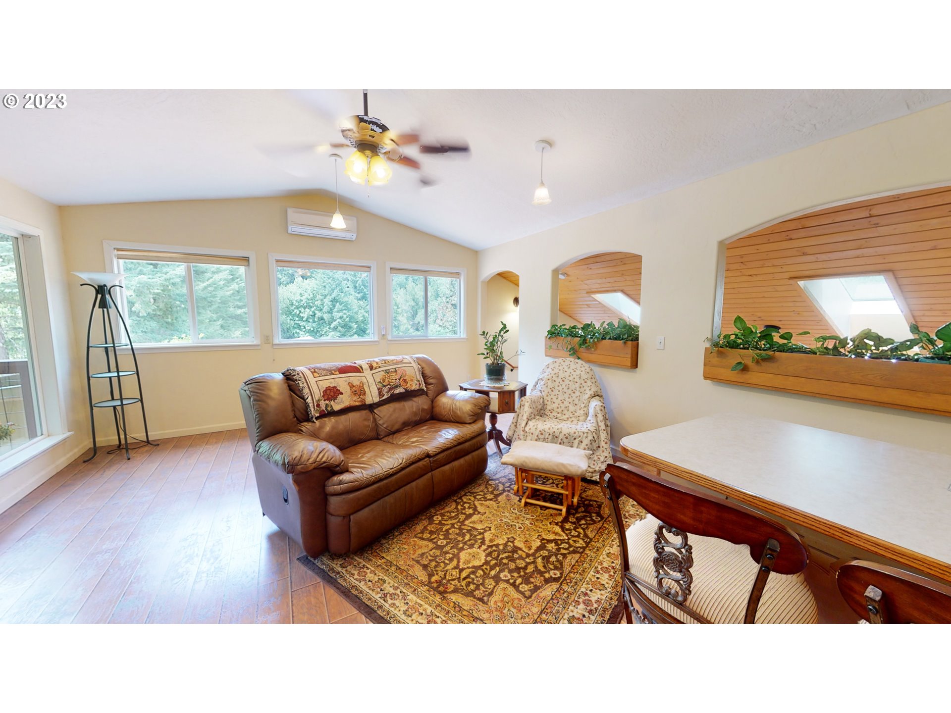 13141 Driver Valley Road Oakland, OR 97462 - Photo 22 of 48 a living room with furniture and a large window