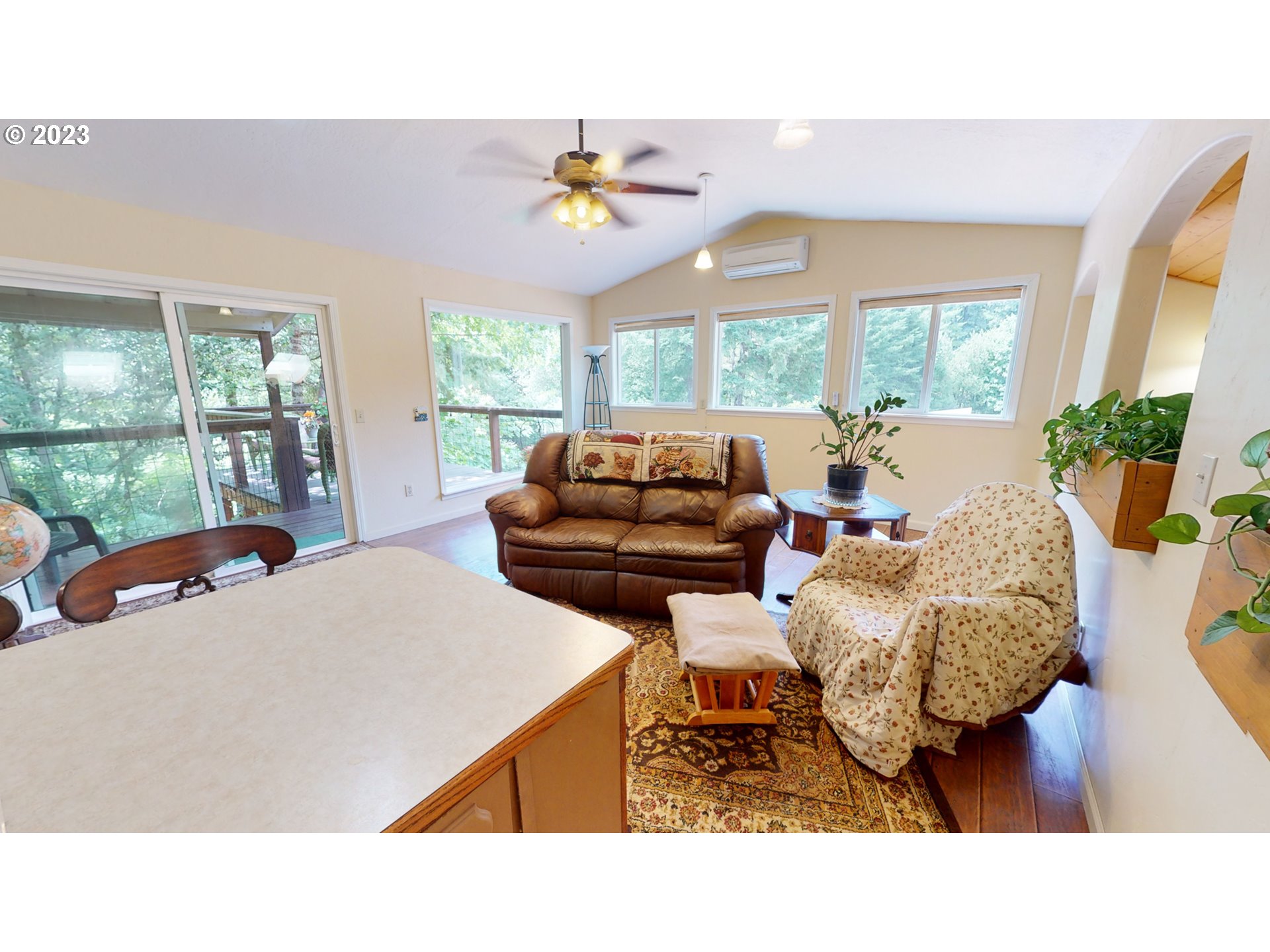 13141 Driver Valley Road Oakland, OR 97462 - Photo 23 of 48 a living room with furniture and a large window