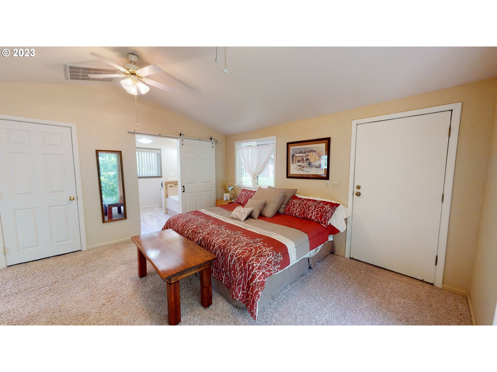 13141 Driver Valley Road Oakland, OR 97462 - Photo 26 of 48 a living room with a bed furniture and a mirror