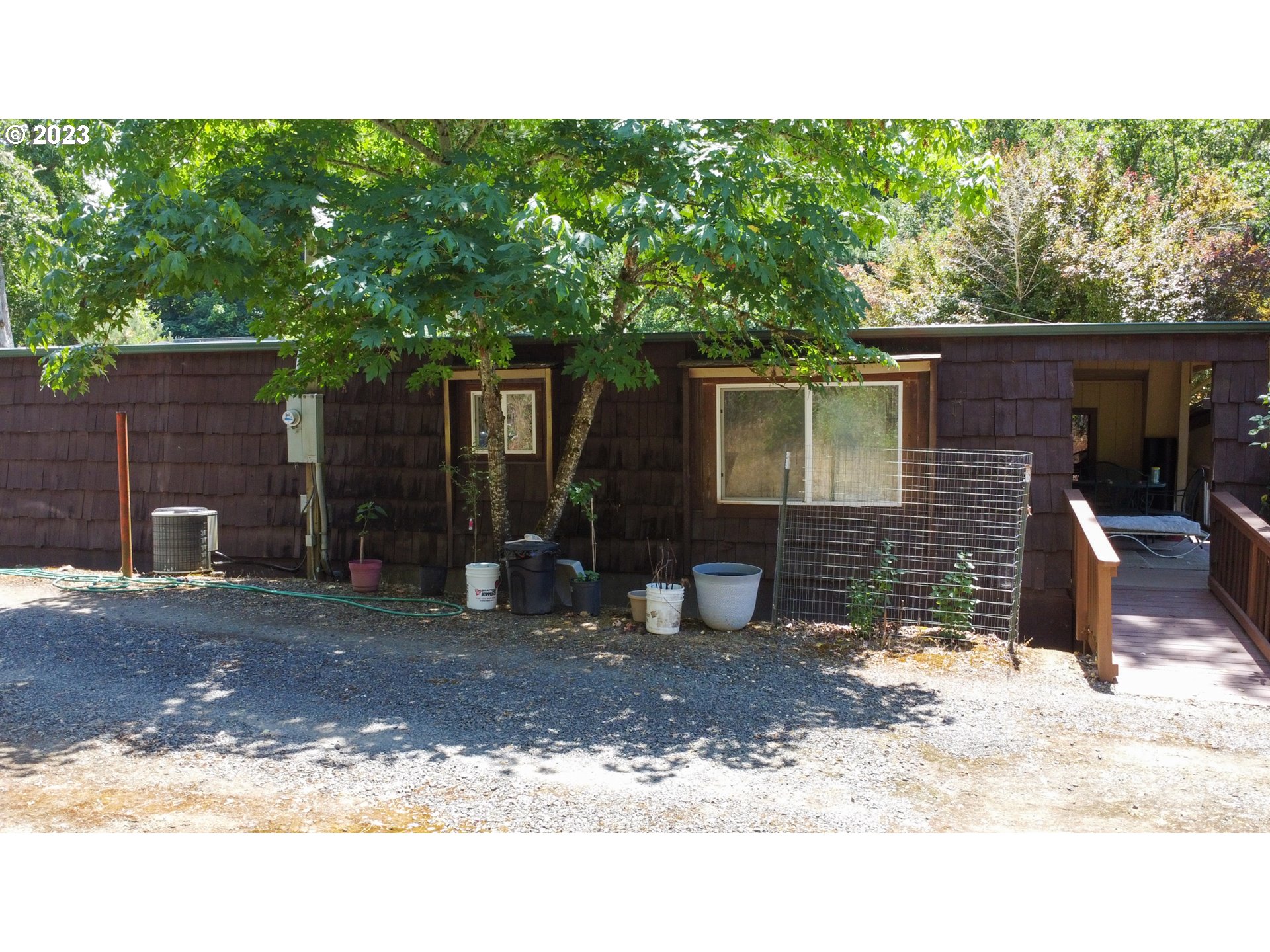 13141 Driver Valley Road Oakland, OR 97462 - Photo 41 of 48 a backyard of a house with seating space