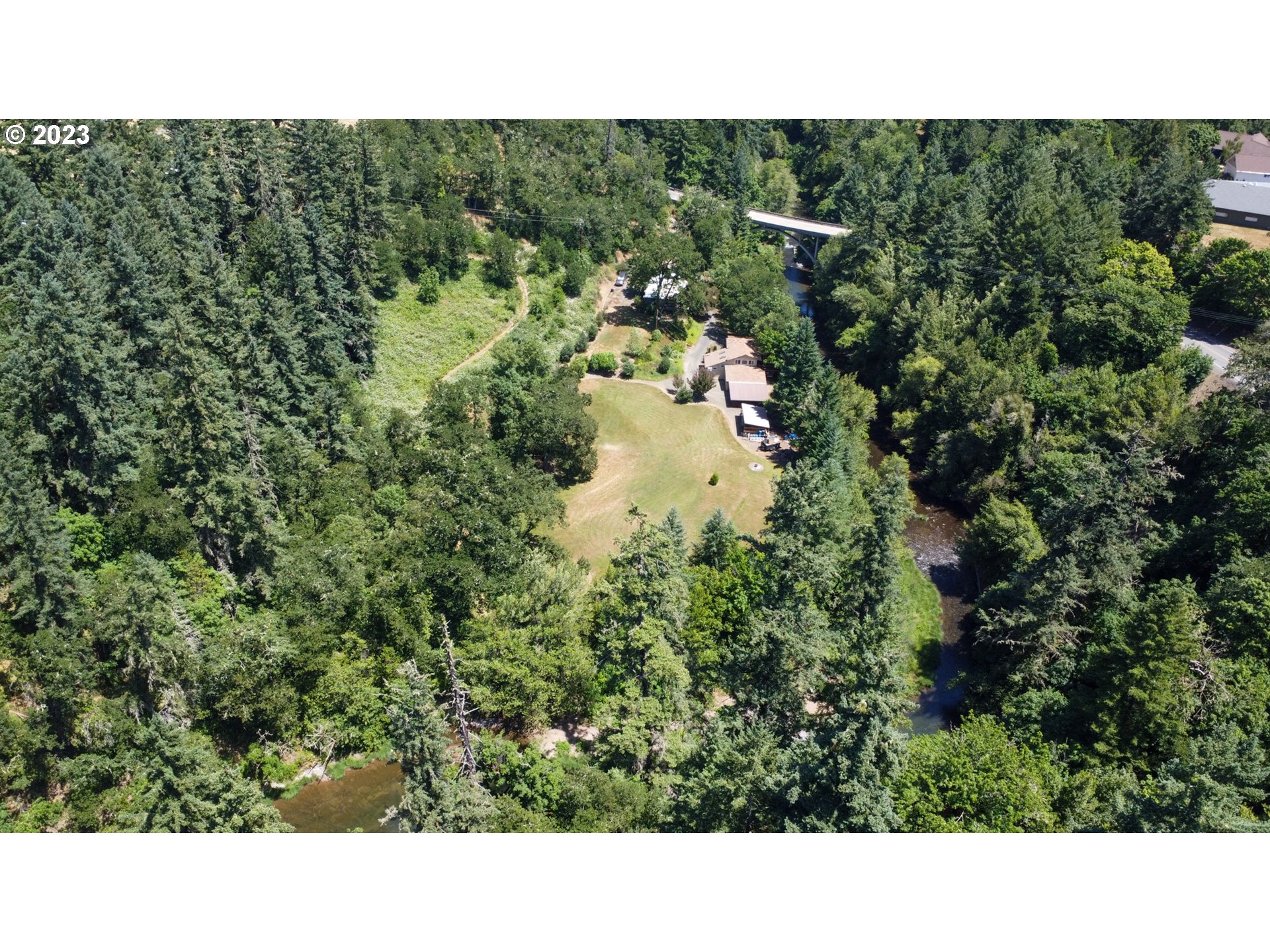 13141 Driver Valley Road Oakland, OR 97462 - Photo 46 of 48 a open area with a yard and mountain