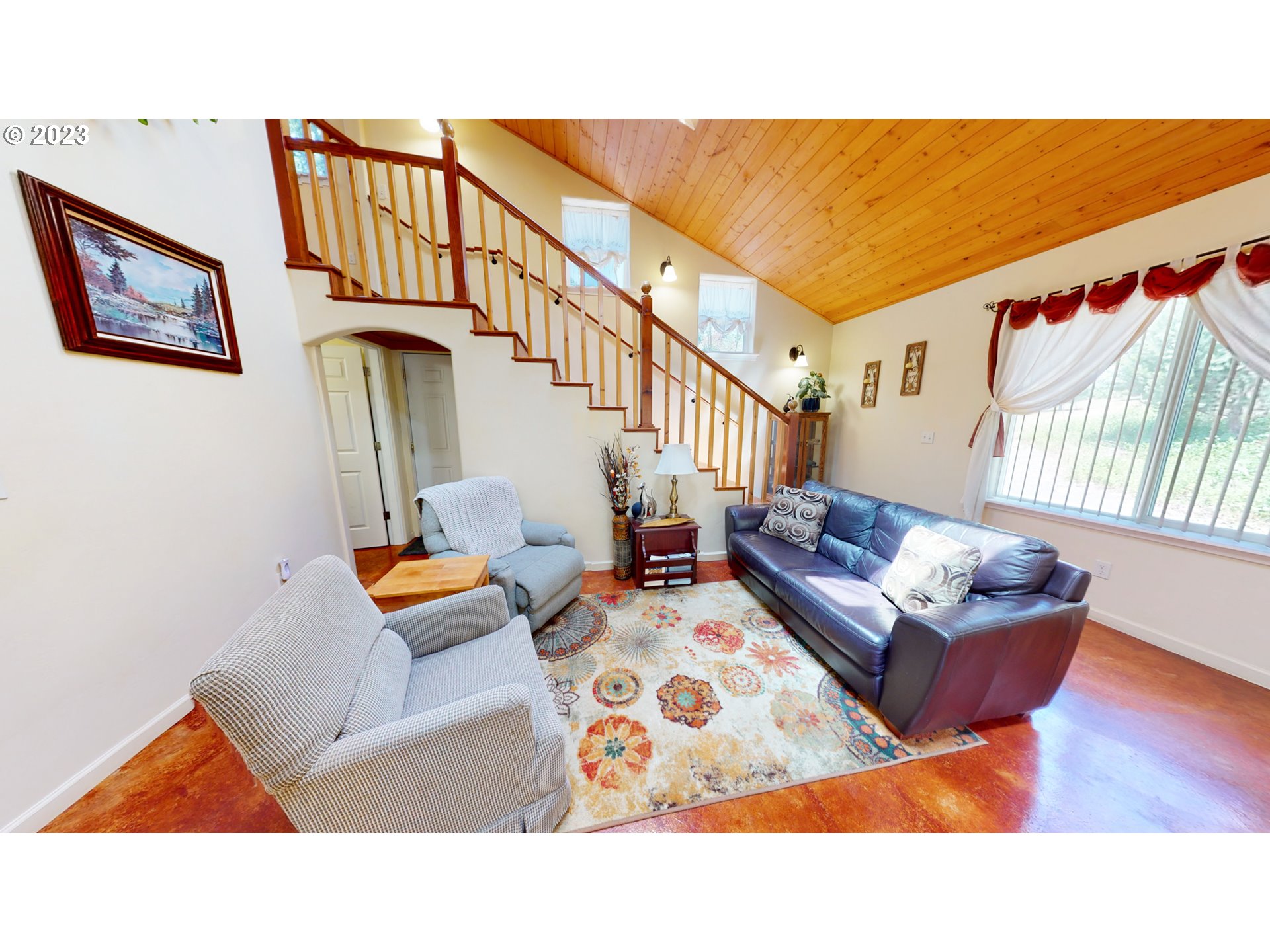 13141 Driver Valley Road Oakland, OR 97462 - Photo 6 of 48 a living room with furniture rug and wooden floor