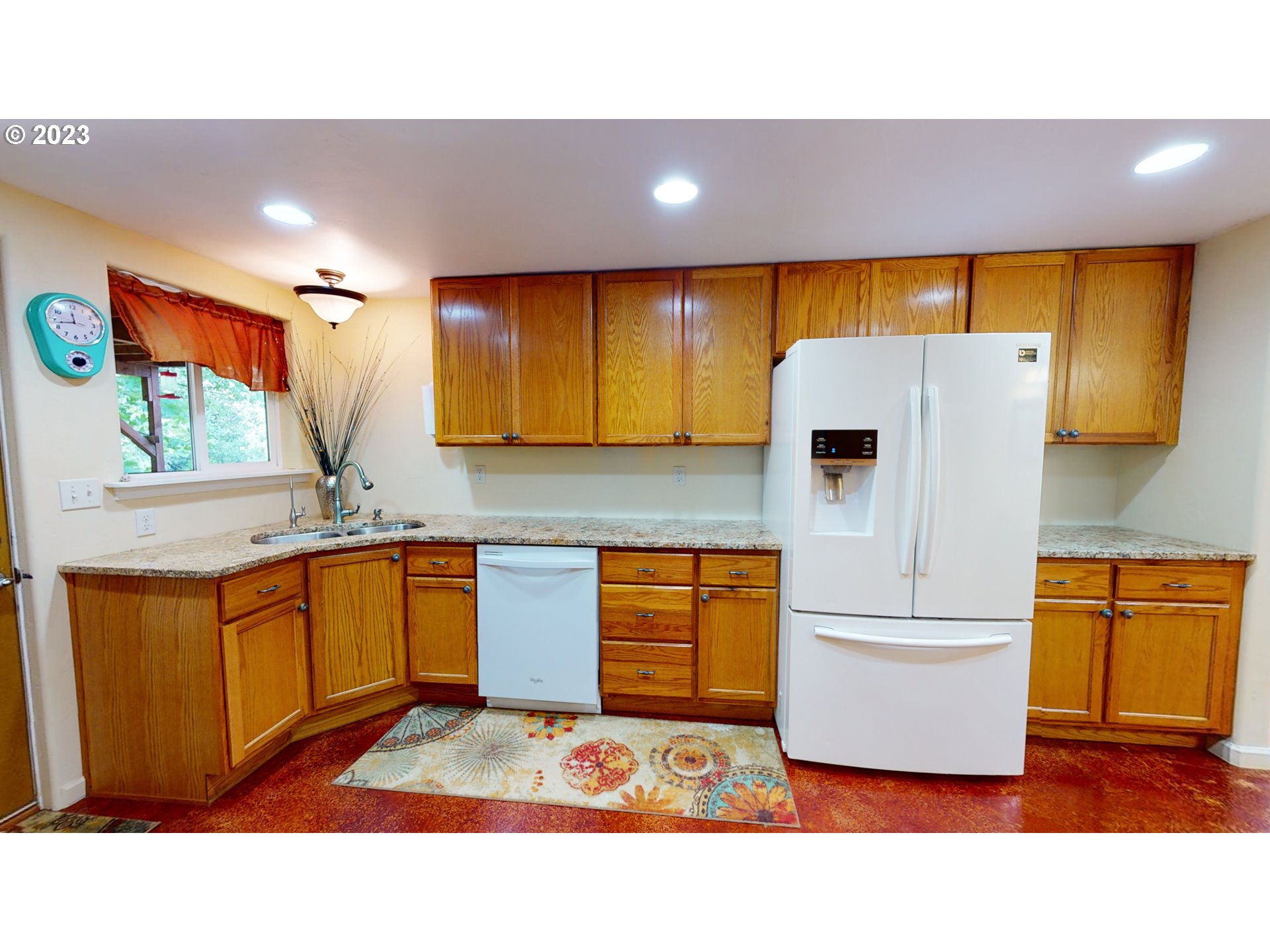 13141 Driver Valley Road Oakland, OR 97462 - Photo 9 of 48 a kitchen with stainless steel appliances granite countertop a refrigerator a stove and a sink