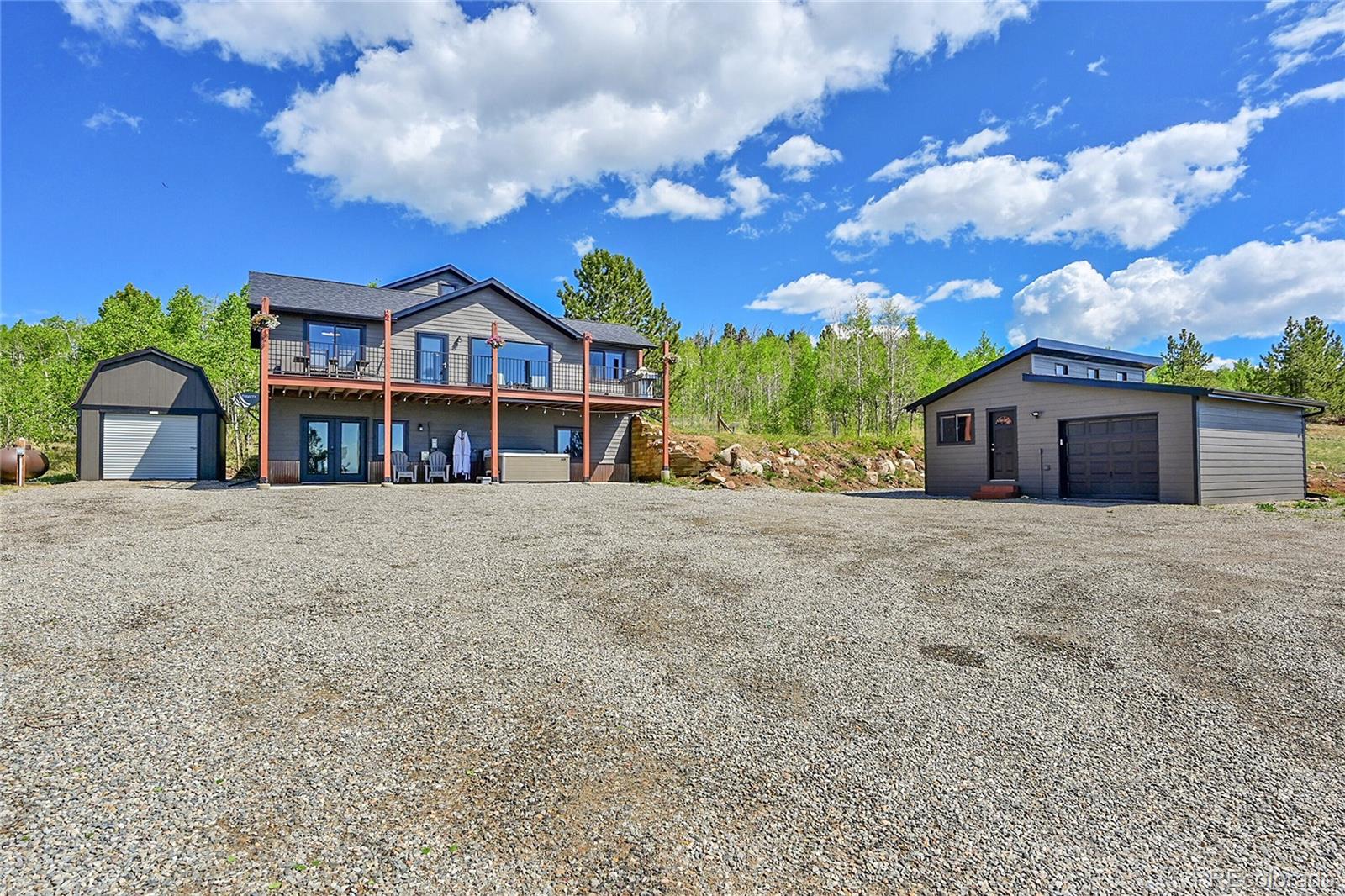 1424 Sheep Ridge Road Fairplay, CO 80440 - Photo 6 of 47 a front view of house with yard and trees