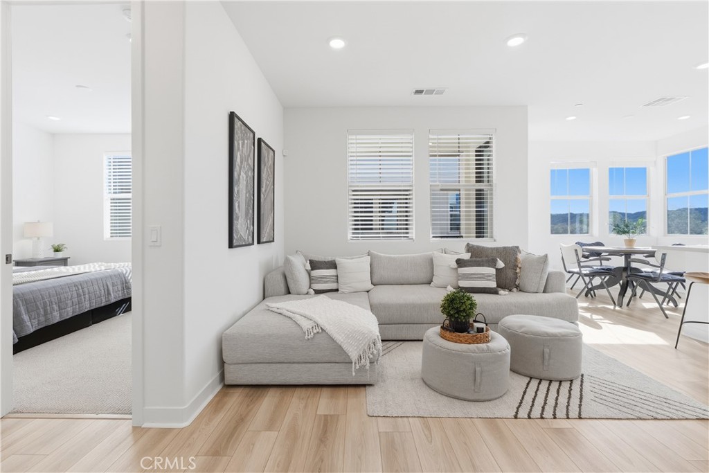 1300 Lasso Way, Unit 305 Rancho Mission Viejo, CA 92694 - Photo 11 of 75 a living room with furniture and a window