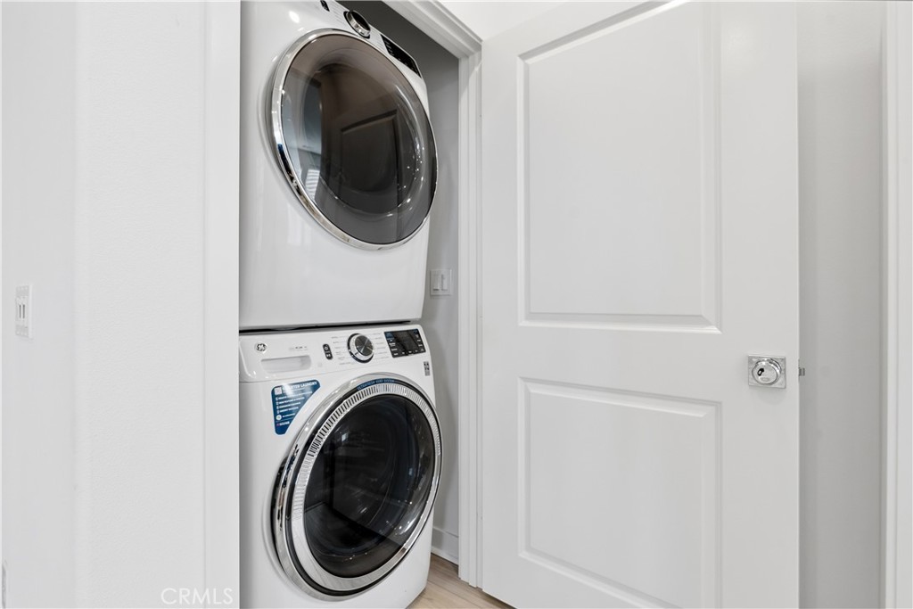 1300 Lasso Way, Unit 305 Rancho Mission Viejo, CA 92694 - Photo 27 of 75 a utility room with dryer and washer