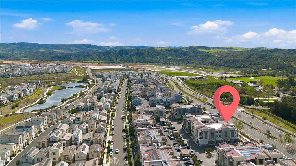 1300 Lasso Way, Unit 305 Rancho Mission Viejo, CA 92694 - Photo 38 of 75 an aerial view of a house with a lake view