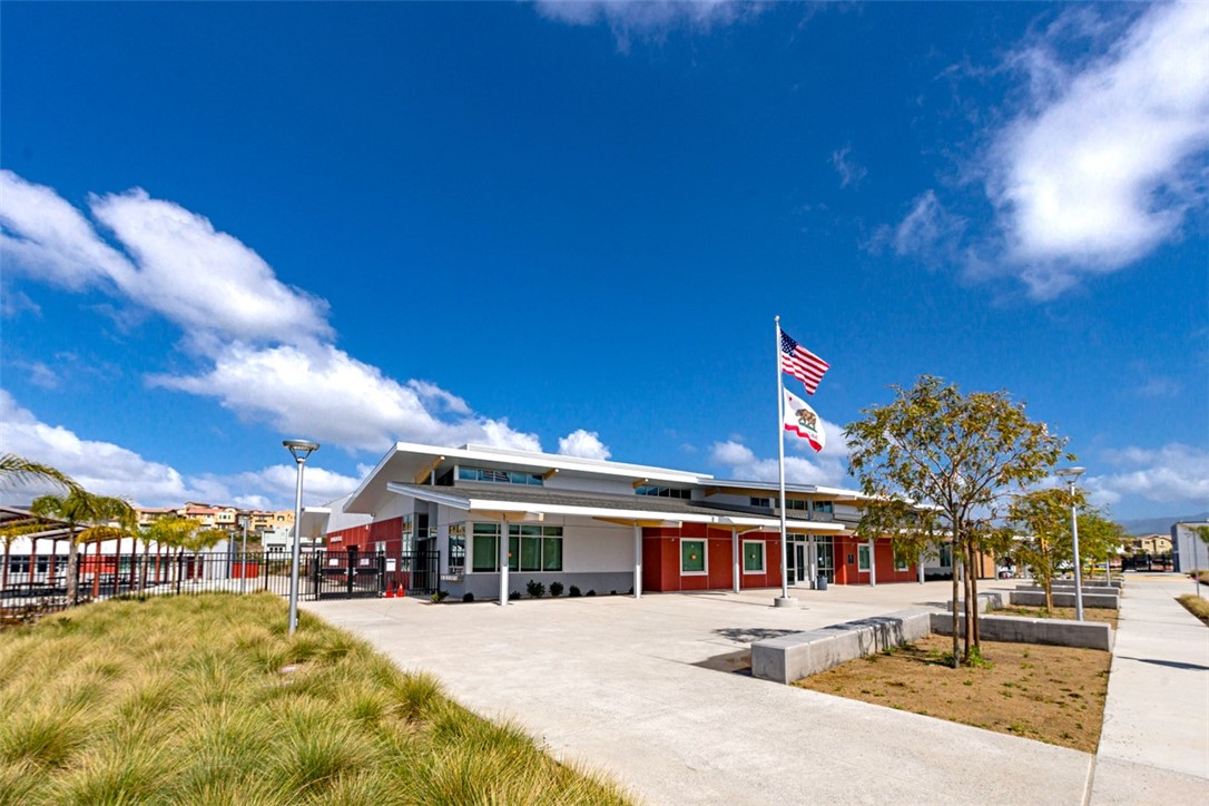 1300 Lasso Way, Unit 305 Rancho Mission Viejo, CA 92694 - Photo 57 of 75 a front view of a house with a yard