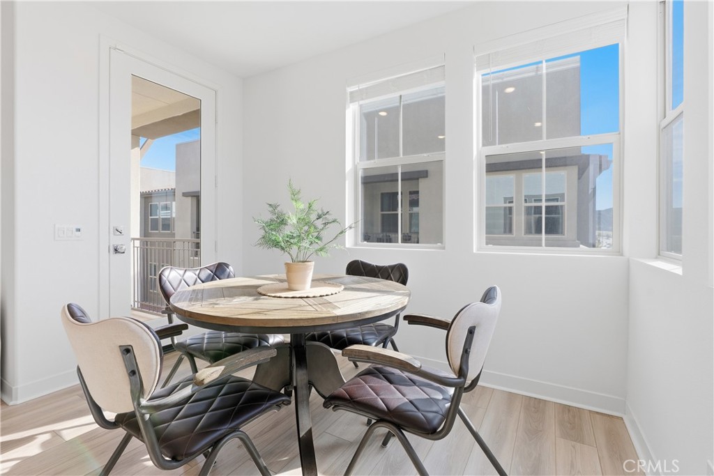 1300 Lasso Way, Unit 305 Rancho Mission Viejo, CA 92694 - Photo 9 of 75 a view of a dining room with furniture and window