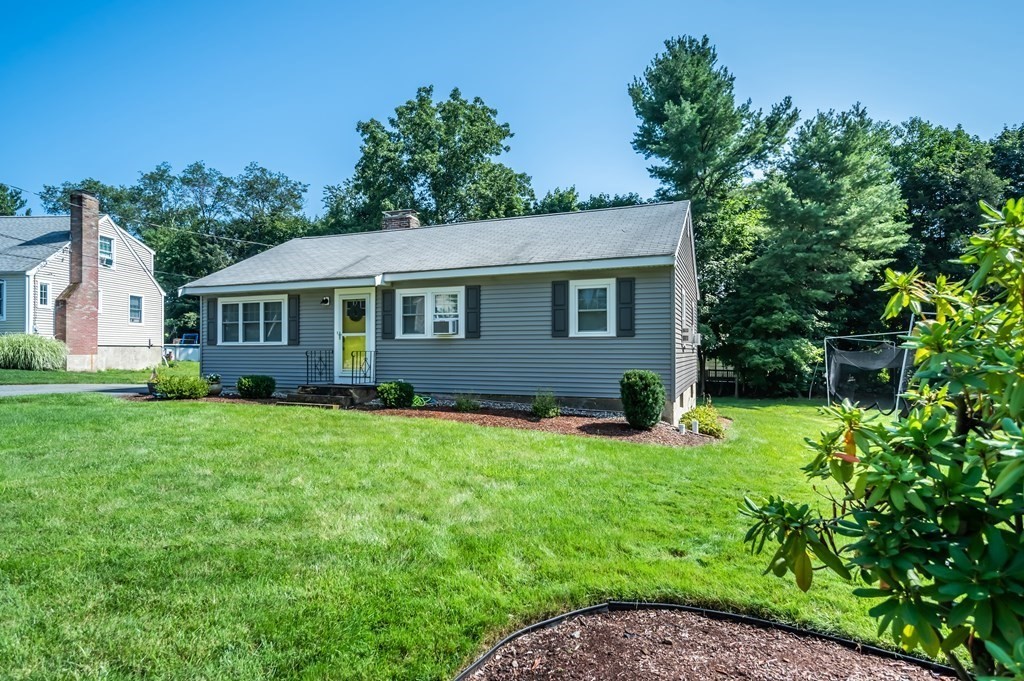 15 Anna Road Woburn, MA 01801 - Photo 3 of 28 a view of a house with backyard and garden
