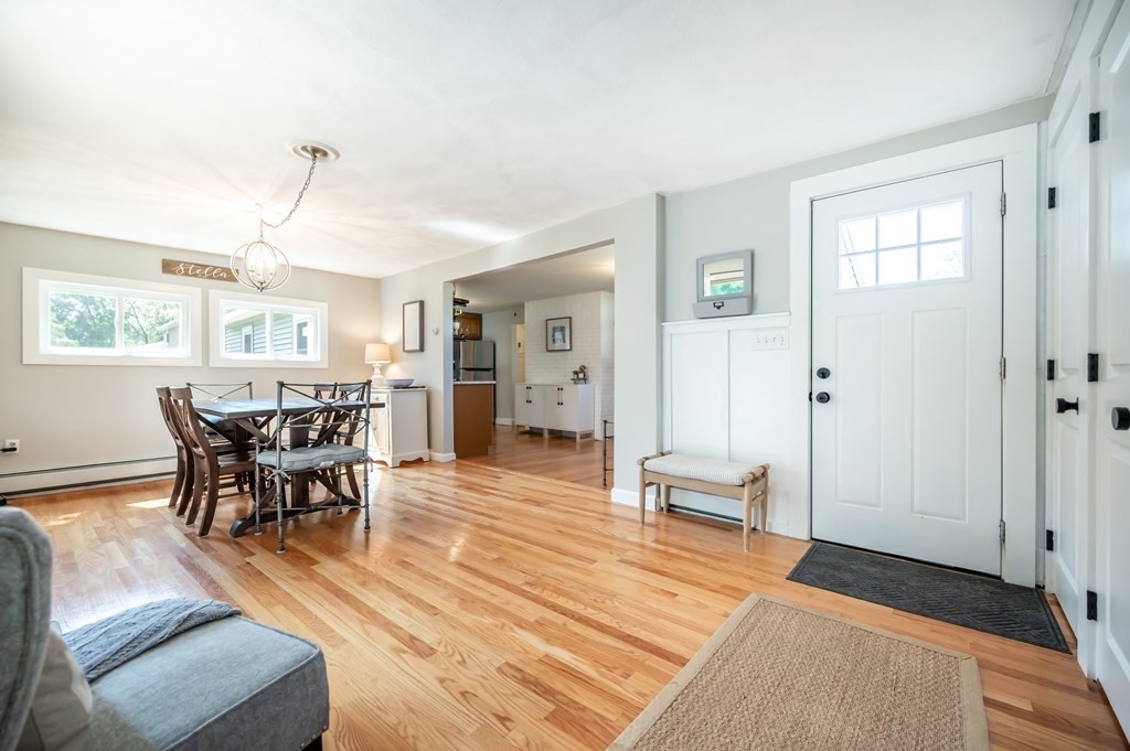 15 Anna Road Woburn, MA 01801 - Photo 4 of 28 a view of a livingroom with furniture and wooden floor