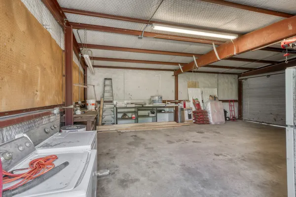 a view of a garage with wooden table