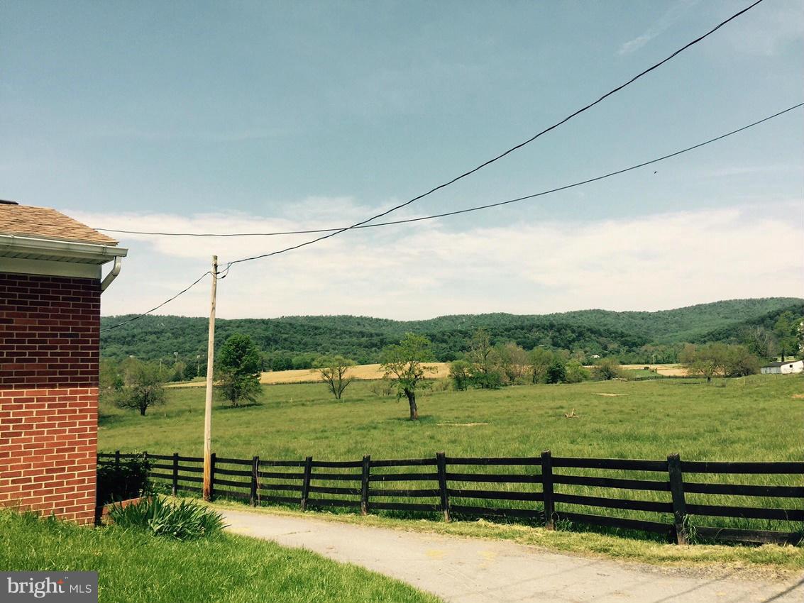 22 North Mill Street Clear Spring, MD 21722 - Photo 2 of 4 a view of a green field with mountains in the background