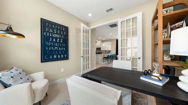 a view of a livingroom with furniture and windows