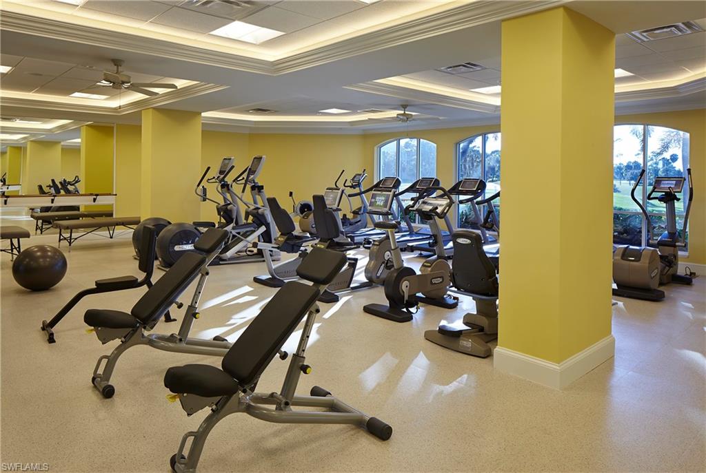 258 Audubon Boulevard Naples, FL 34110 - Photo 18 of 30 a view of a room with gym equipment
