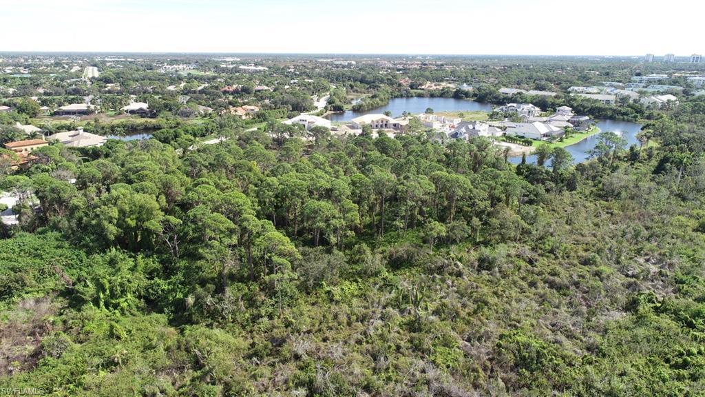 258 Audubon Boulevard Naples, FL 34110 - Photo 7 of 30 an aerial view of multiple house