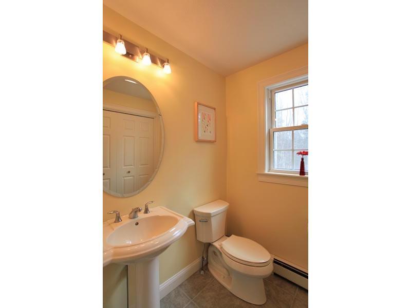 86 Autumn Ridge Road Cumberland Center, ME 04021 - Photo 11 of 19 Bathroom. lst floor llaundry with...