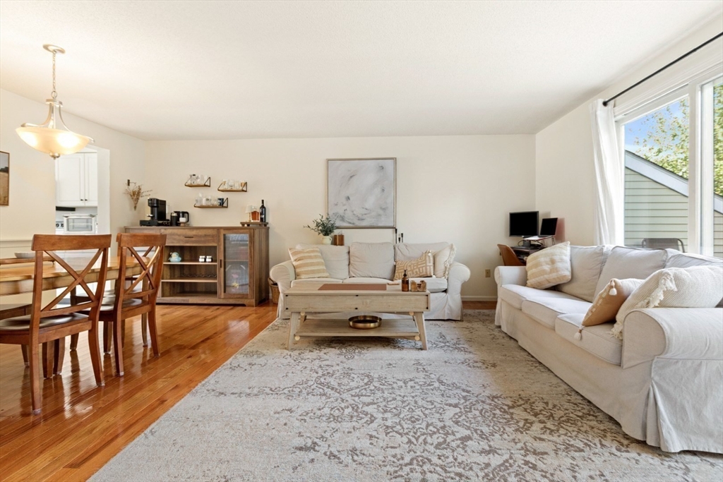 108 Abington Road, Unit 108 Danvers, MA 01923 - Photo 12 of 34 a living room with furniture and wooden floor