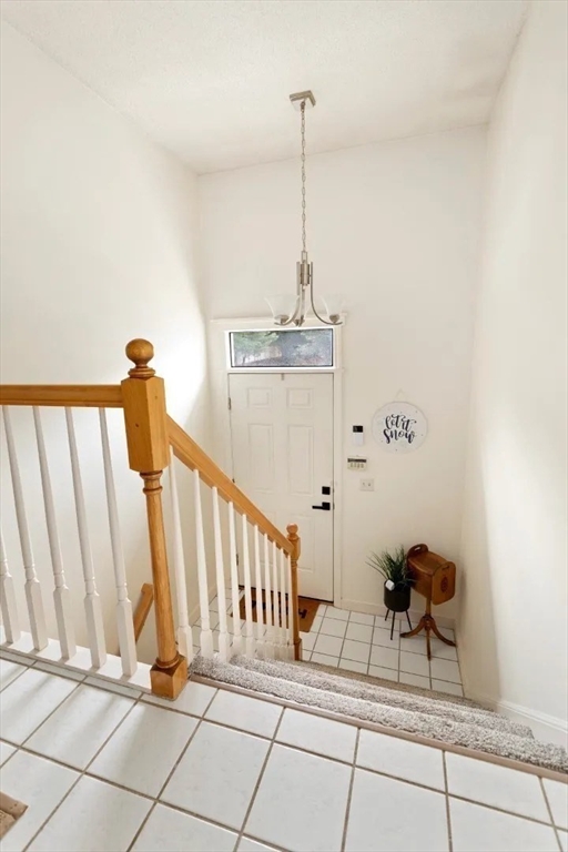108 Abington Road, Unit 108 Danvers, MA 01923 - Photo 14 of 34 a view of a hallway with staircase