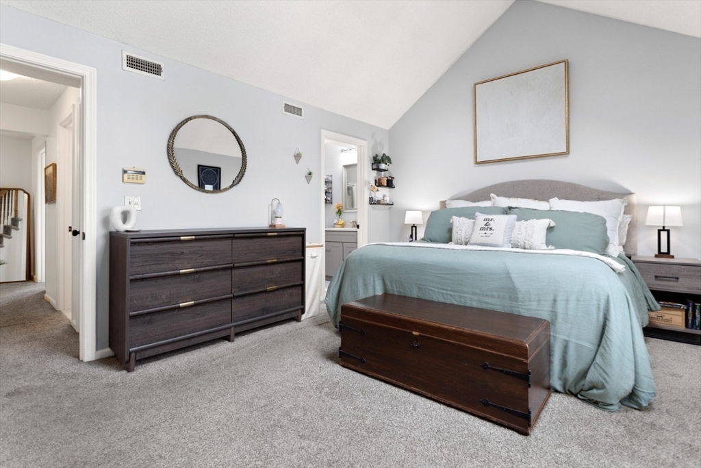 108 Abington Road, Unit 108 Danvers, MA 01923 - Photo 16 of 34 a bedroom with a bed and a dresser