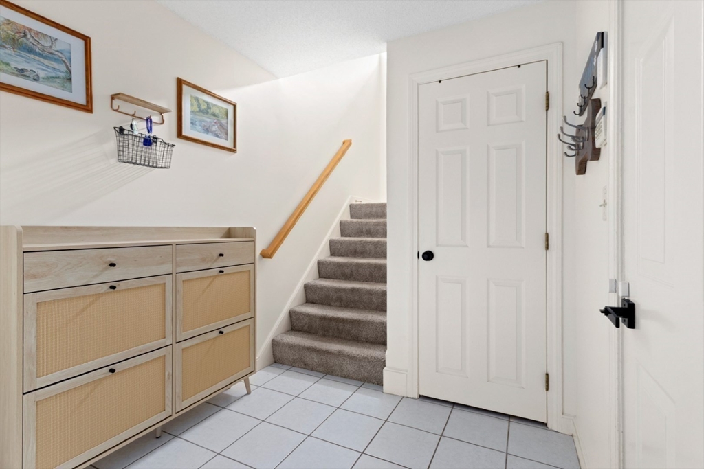 108 Abington Road, Unit 108 Danvers, MA 01923 - Photo 27 of 34 a view of a hallway with closet
