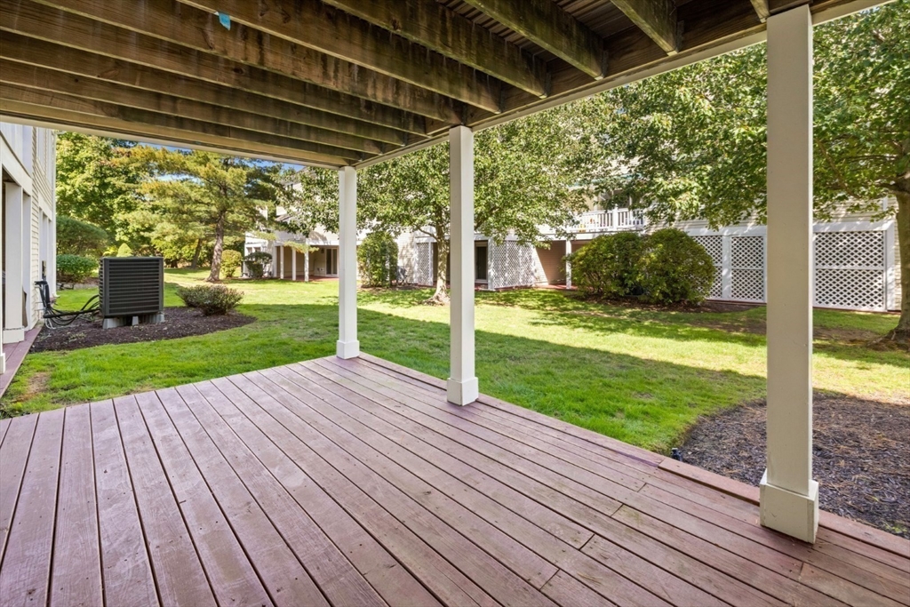 108 Abington Road, Unit 108 Danvers, MA 01923 - Photo 31 of 34 a view of porch with a backyard