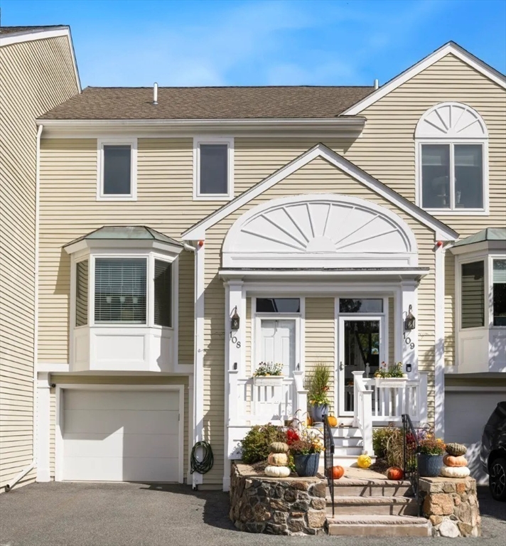 108 Abington Road, Unit 108 Danvers, MA 01923 - Photo 4 of 34 a front view of a house with entertaining space