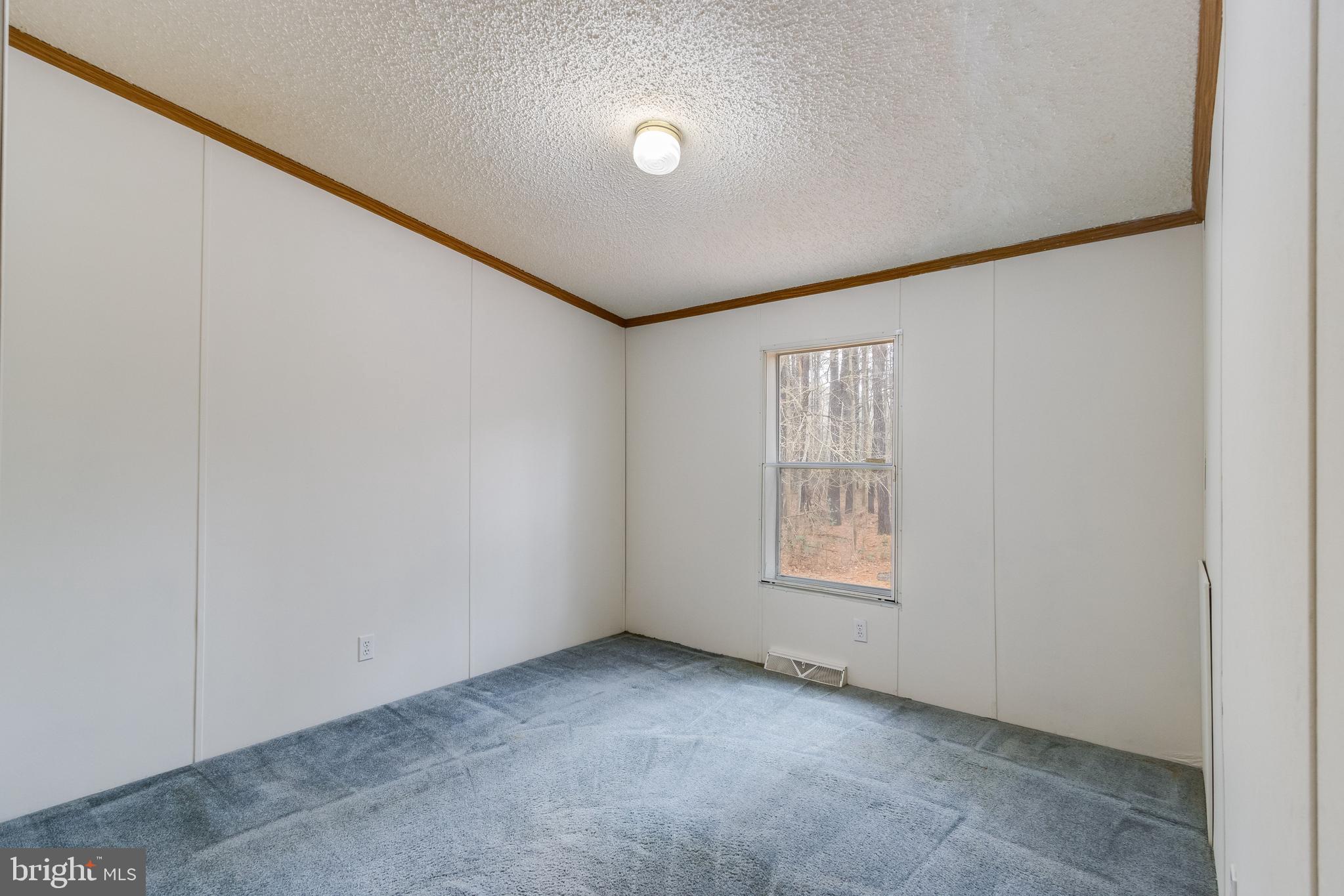 2578 Williamsville Road Houston, DE 19954 - Photo 24 of 52 a view of an empty room with windows