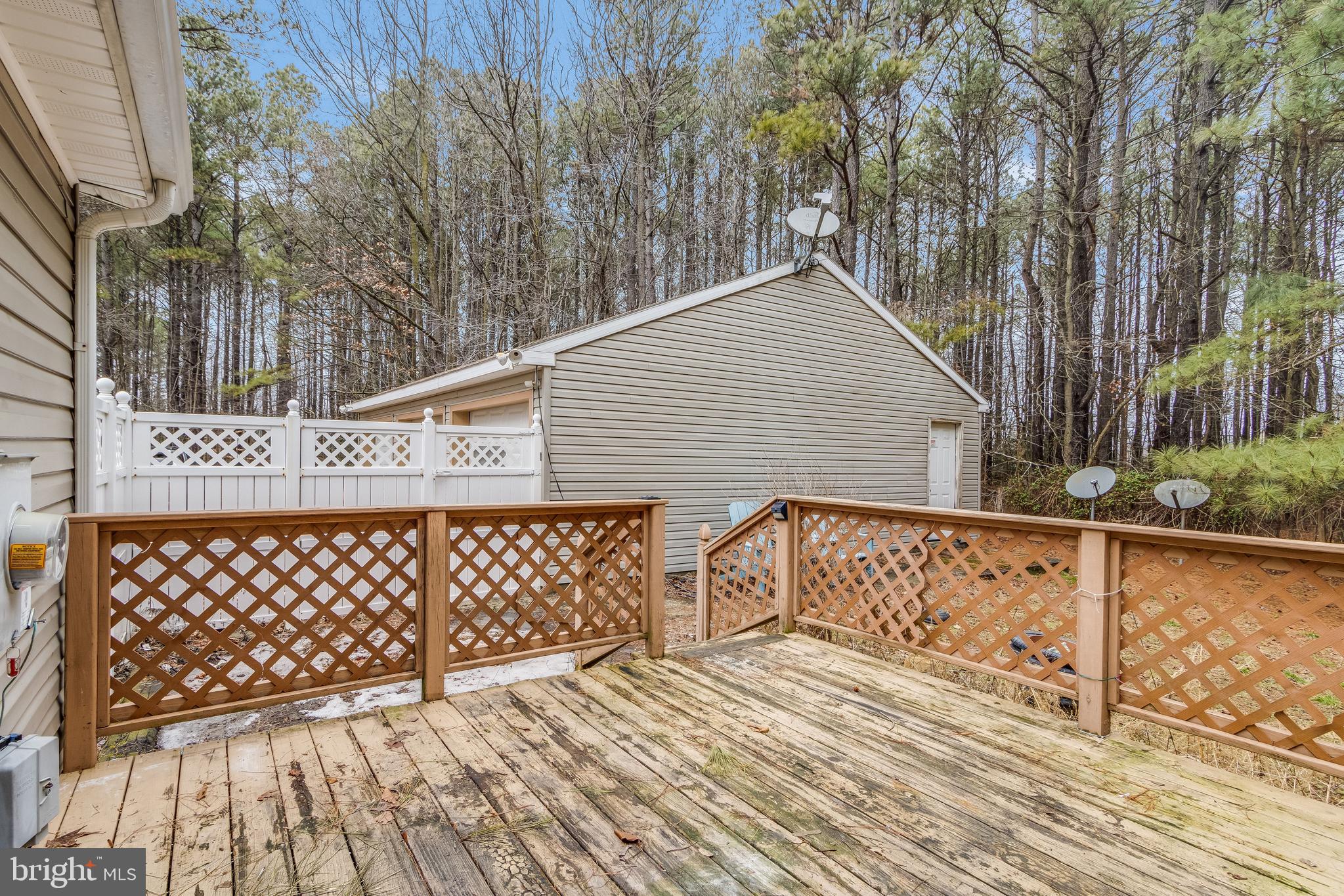 2578 Williamsville Road Houston, DE 19954 - Photo 41 of 52 a view of a wooden roof deck
