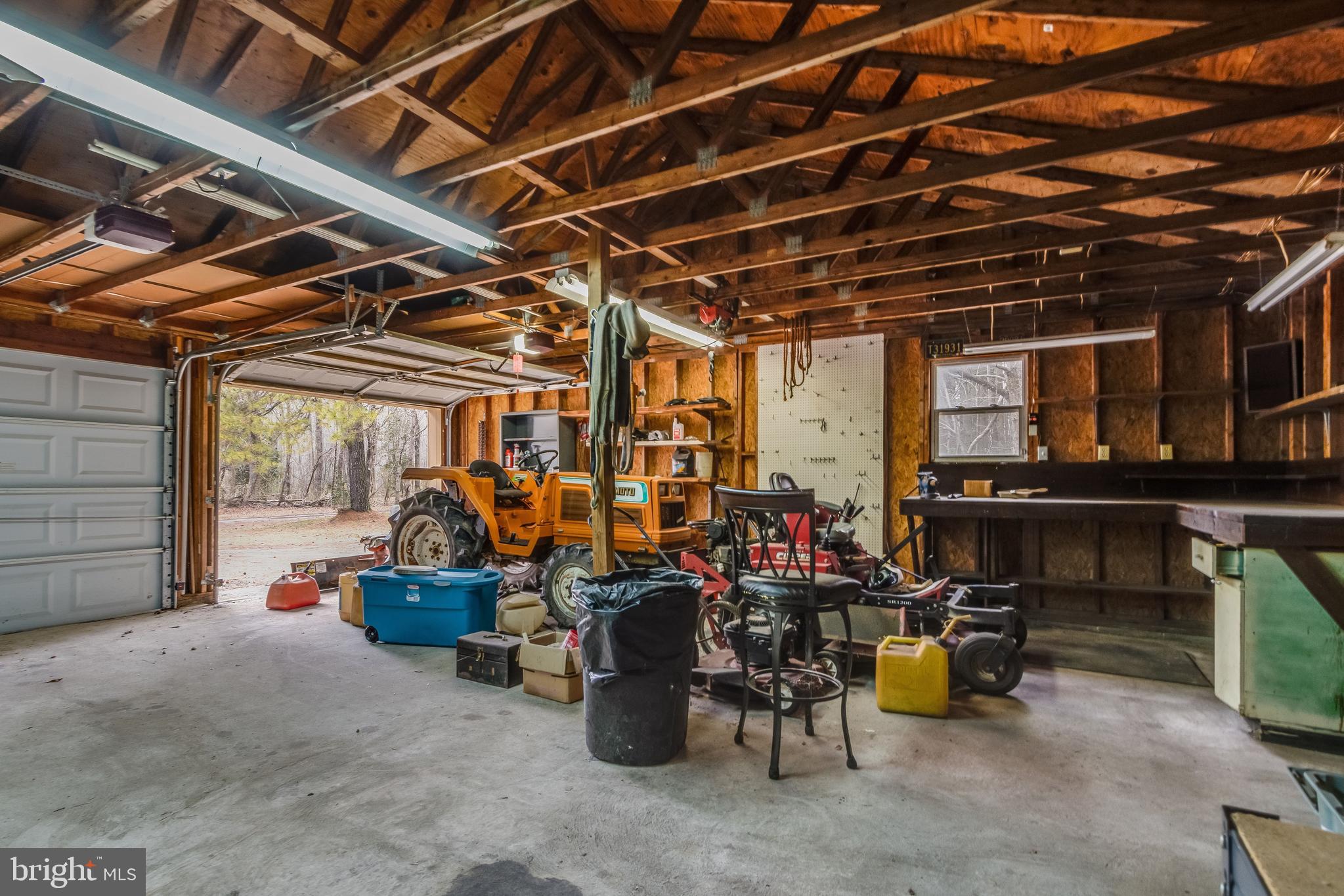 2578 Williamsville Road Houston, DE 19954 - Photo 46 of 52 a view of a storage room with chairs