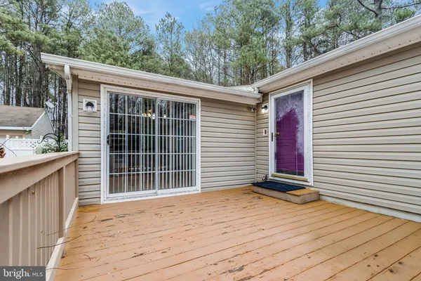 a view of backyard with deck