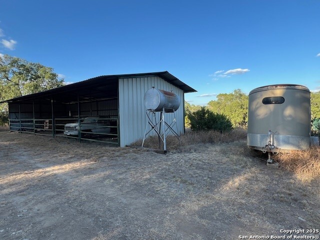 6511 Farm To Market Road 311 Spring Branch, TX 78070 - Photo 14 of 50 a view of a house with a yard