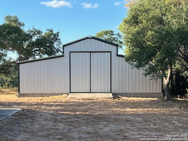 6511 Farm To Market Road 311 Spring Branch, TX 78070 - Photo 2 of 50 a view of wooden house
