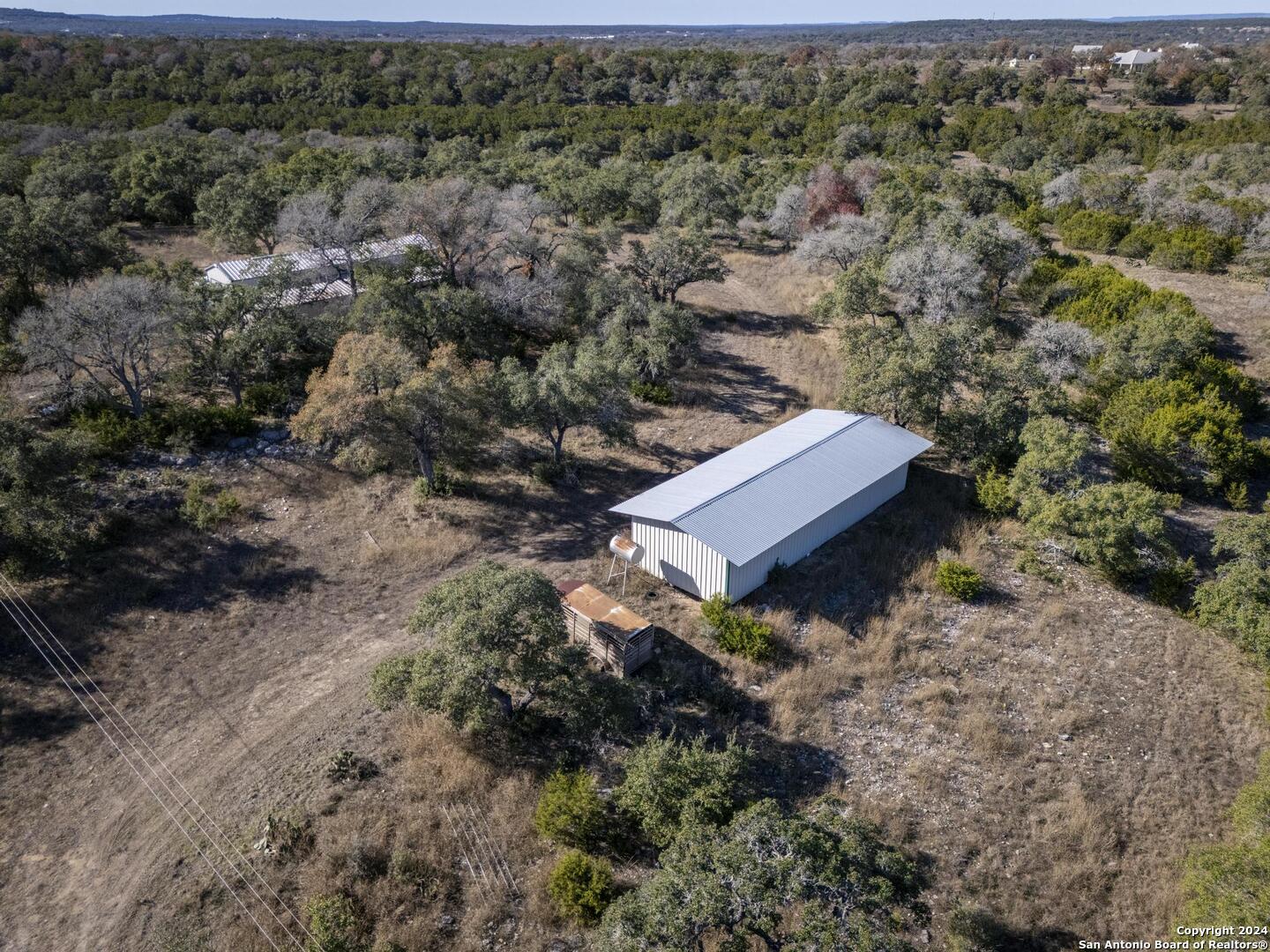 6511 Farm To Market Road 311 Spring Branch, TX 78070 - Photo 22 of 50 a view of a forest with a forest