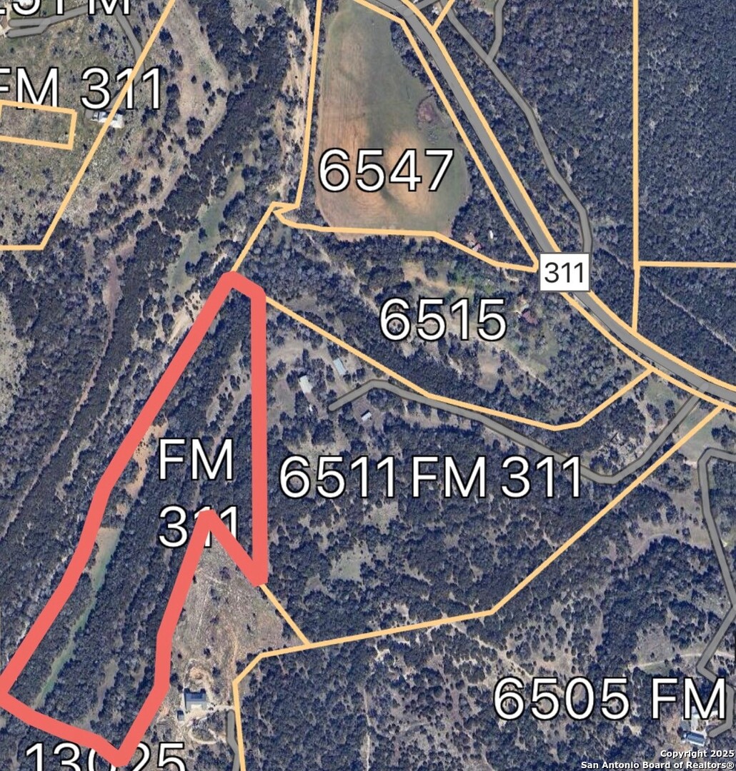 6511 Farm To Market Road 311 Spring Branch, TX 78070 - Photo 8 of 50 a close up of a street sign