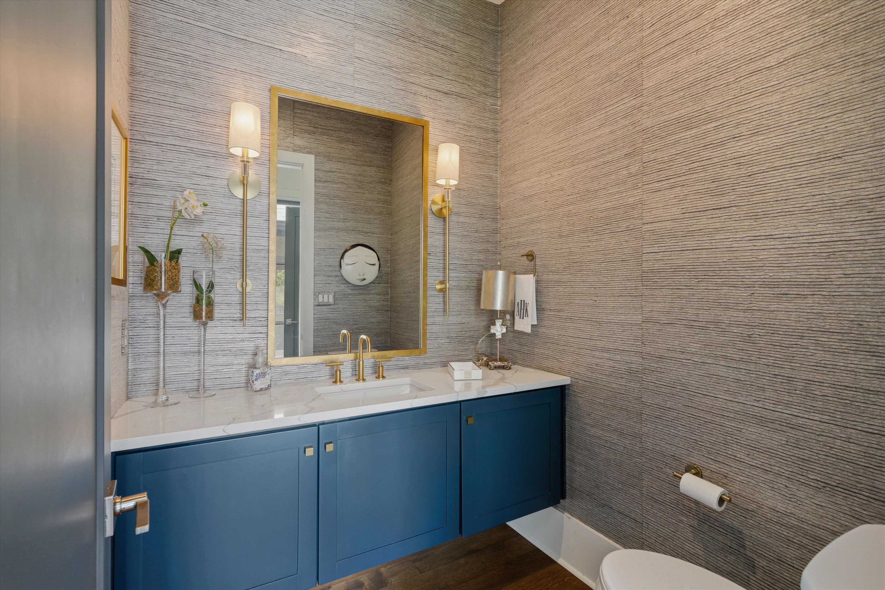 4710 Gwynne Road Memphis, TN 38117 - Photo 30 of 40 a bathroom with a granite countertop toilet sink and mirror