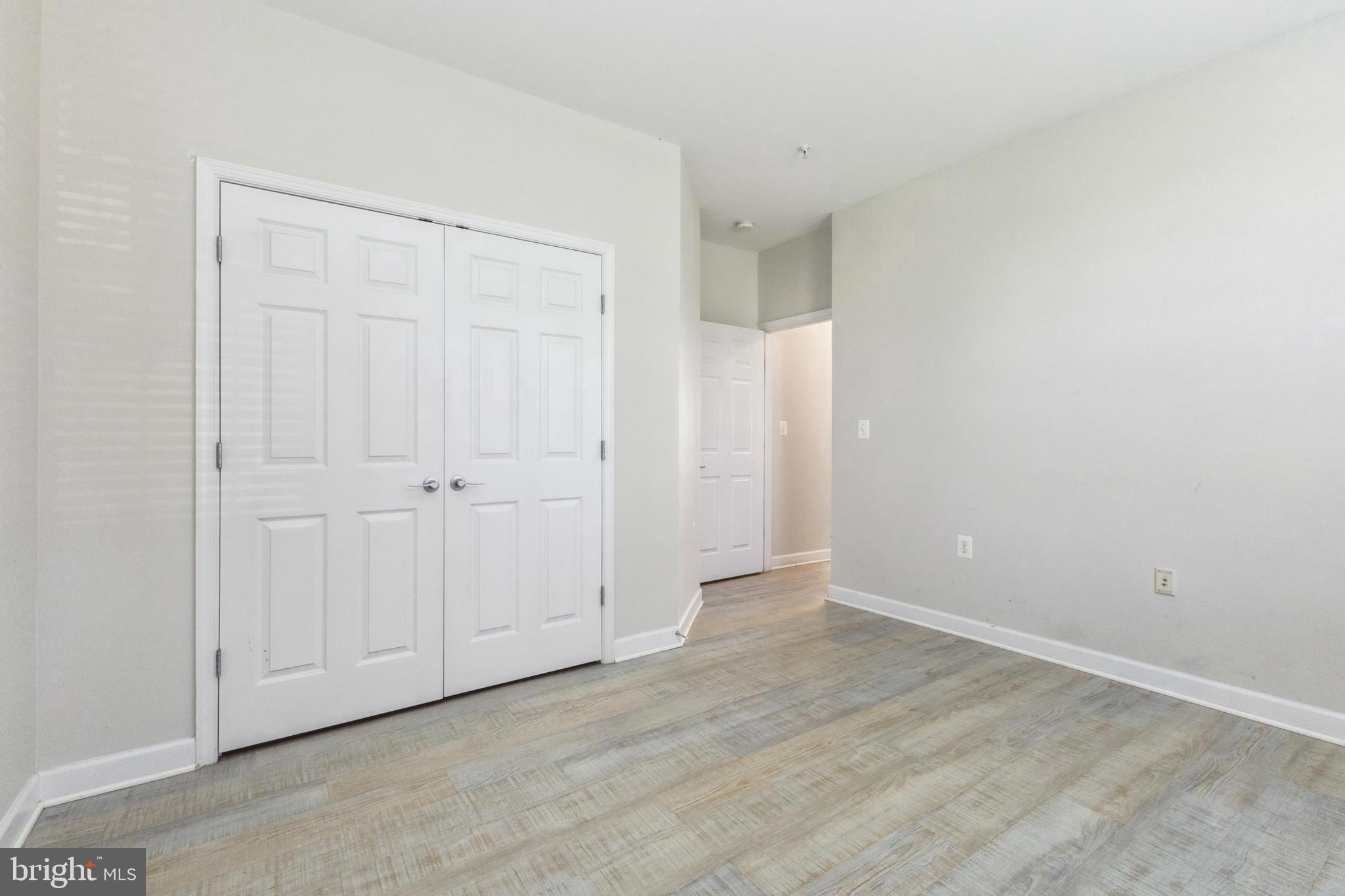 22664 Blue Elder Terrace, Unit 102 Brambleton, VA 20148 - Photo 21 of 25 a view of an empty room
