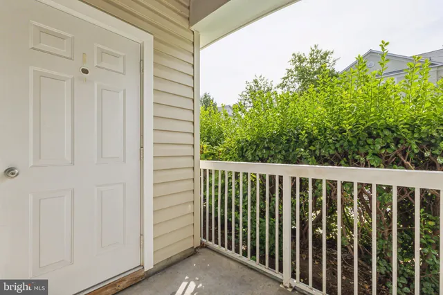a view of a balcony with an outdoor space