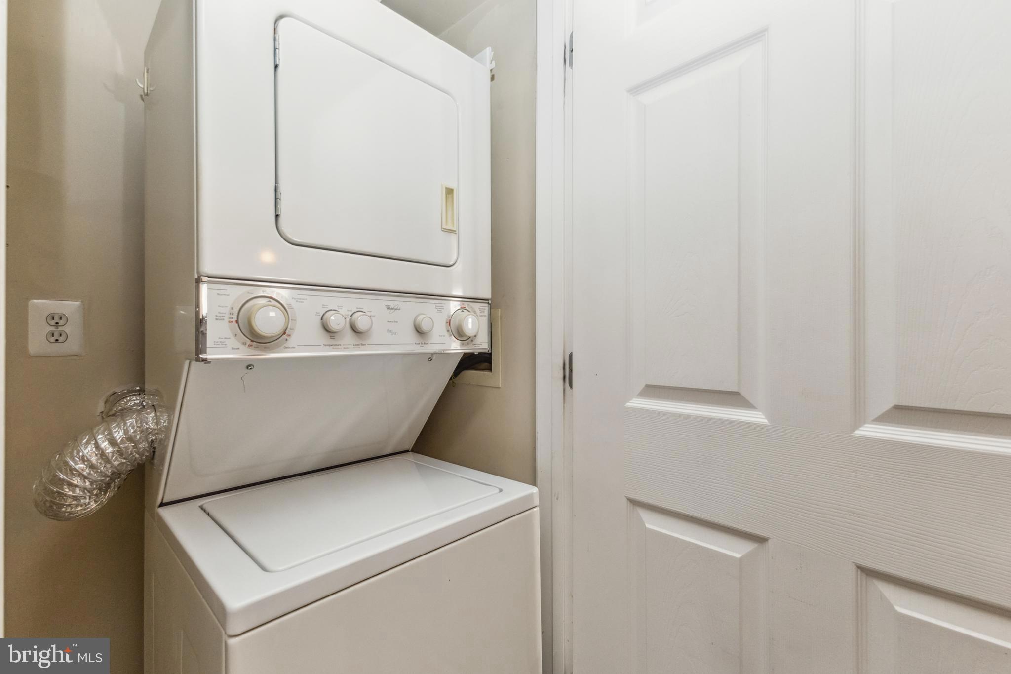 22664 Blue Elder Terrace, Unit 102 Brambleton, VA 20148 - Photo 24 of 25 a bathroom with a sink and a mirror