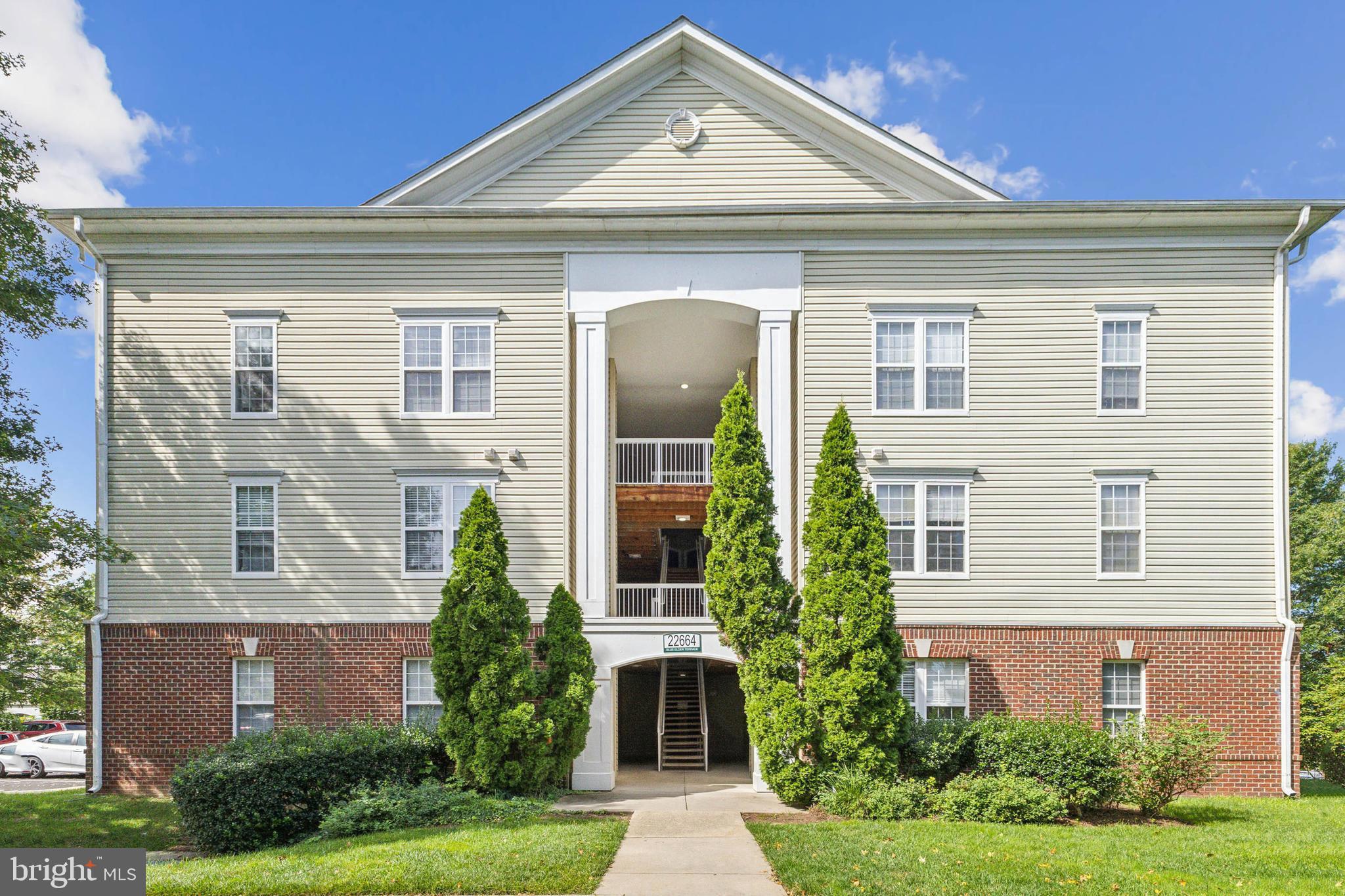 22664 Blue Elder Terrace, Unit 102 Brambleton, VA 20148 - Photo 25 of 25 front view of a house