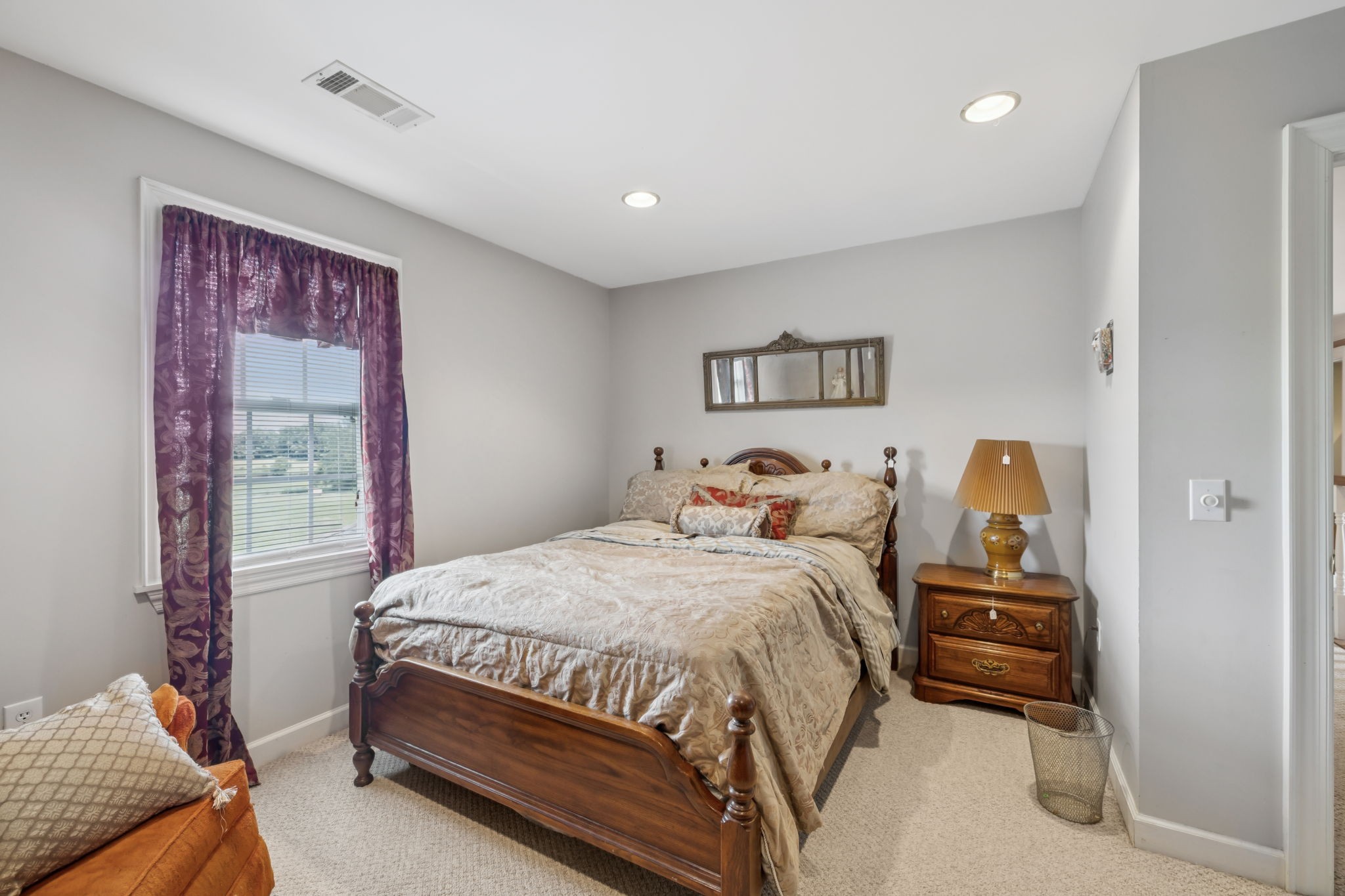 33 Bishop Road Lawrenceburg, TN 38464 - Photo 51 of 87 a bedroom with a bed and a painting on the wall