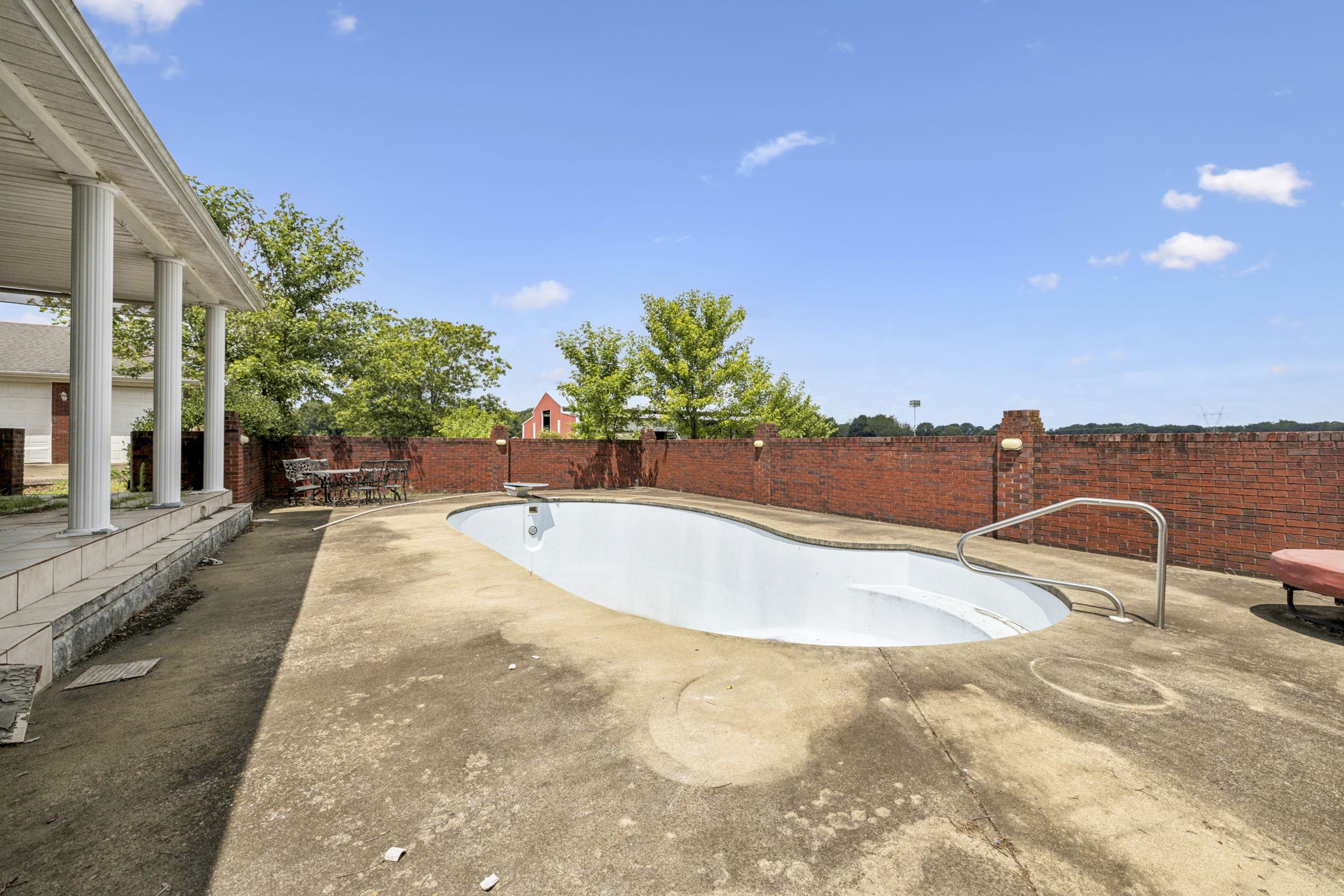 33 Bishop Road Lawrenceburg, TN 38464 - Photo 56 of 87 a view of a swimming pool with a yard