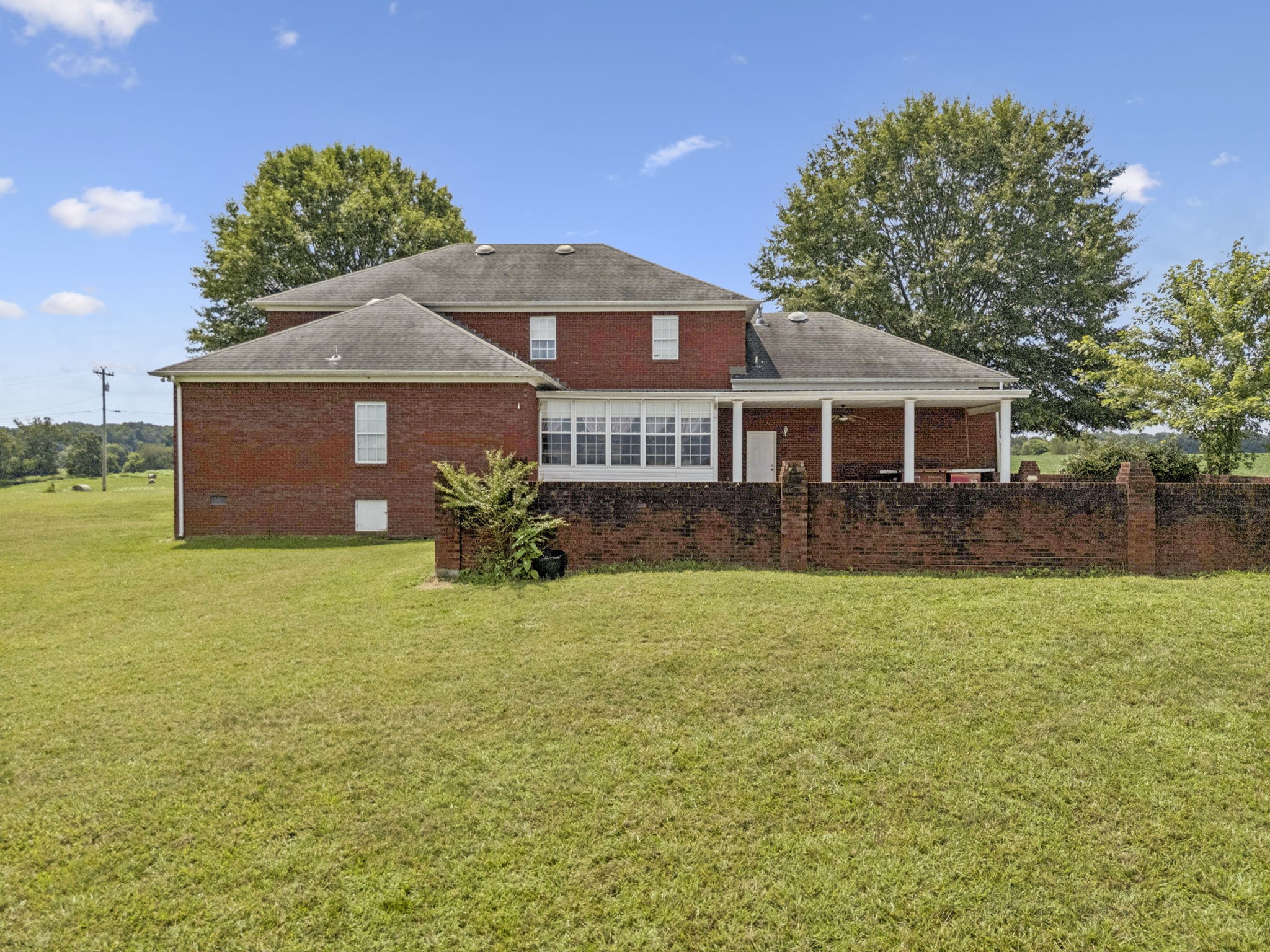 33 Bishop Road Lawrenceburg, TN 38464 - Photo 71 of 87 a front view of a house with garden