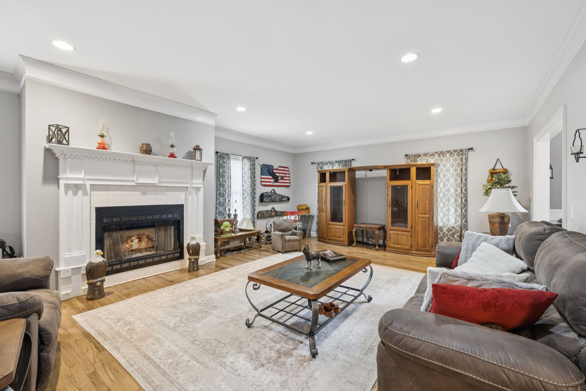 33 Bishop Road Lawrenceburg, TN 38464 - Photo 9 of 87 a living room with furniture and a fireplace